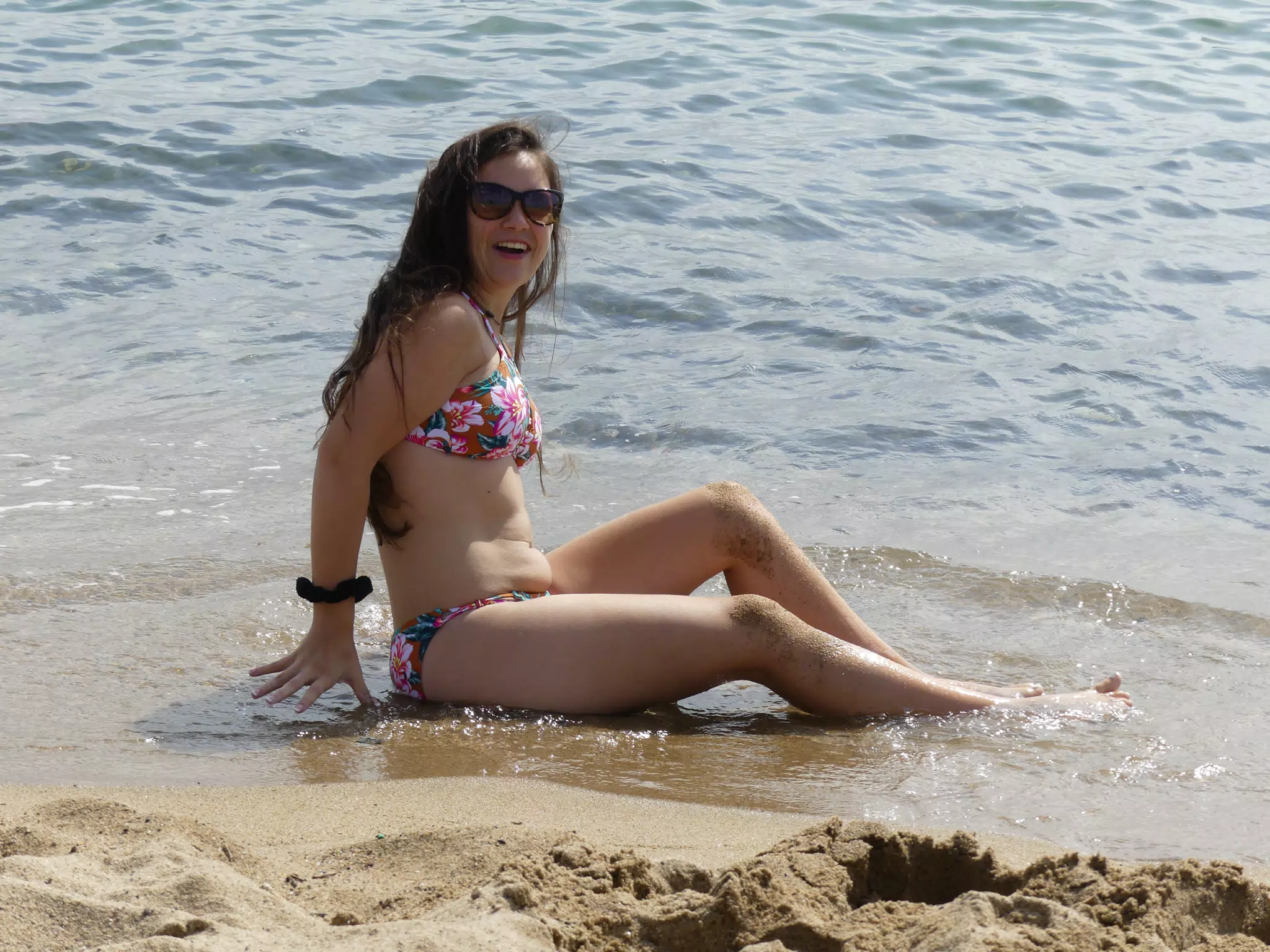 Emily Surprised by the Surf on Barcelona Beach
