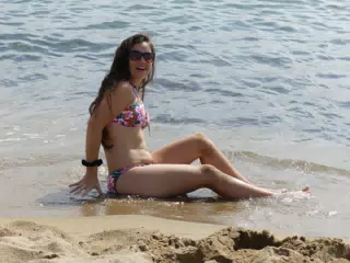 Emily Surprised by the Surf on Barcelona Beach