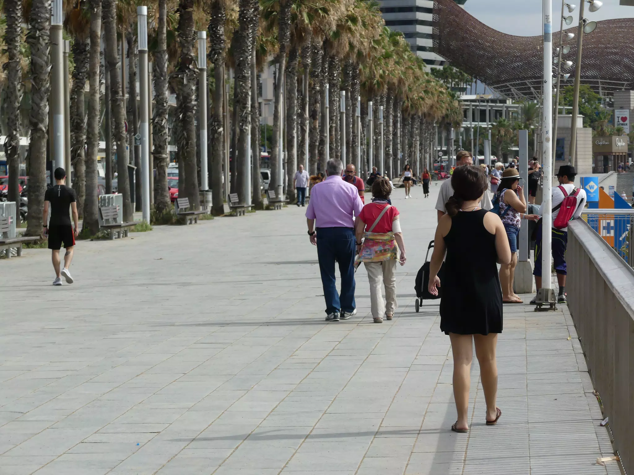Emily Walking in Black Dress in Barcelona