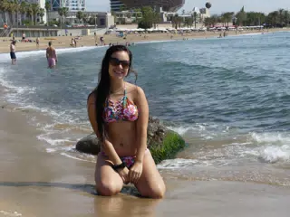 Girl Kneeling on Barcelonetta Beach