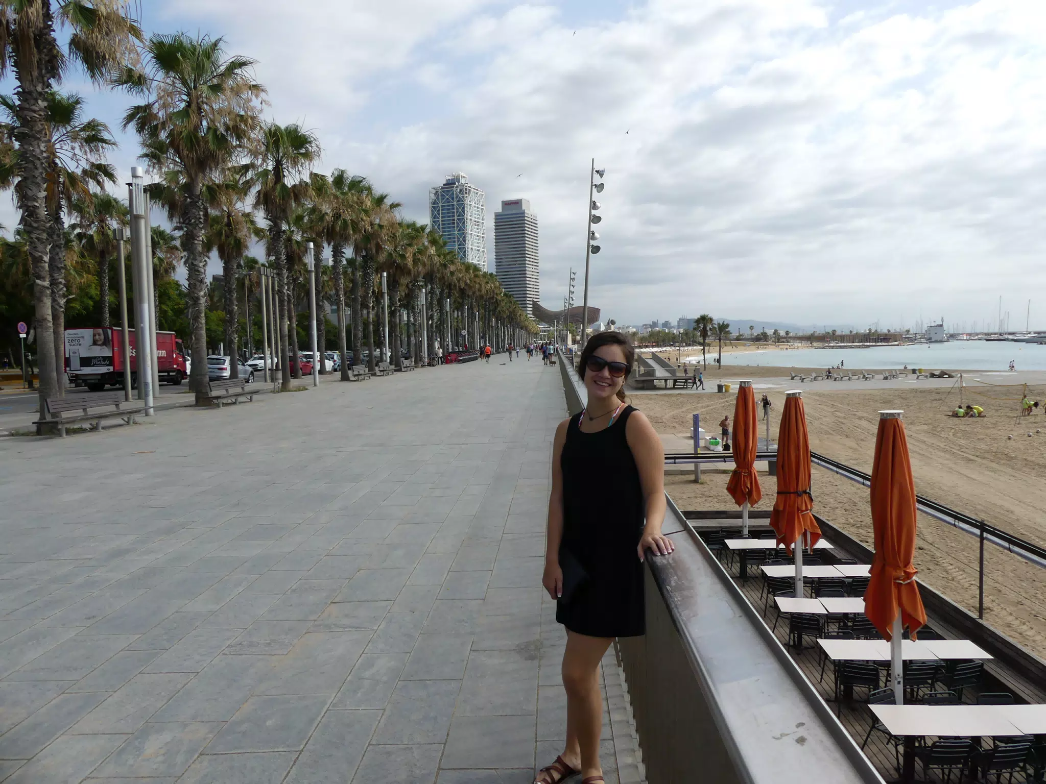Emily in Black Dress on the Promenade in Barcelona