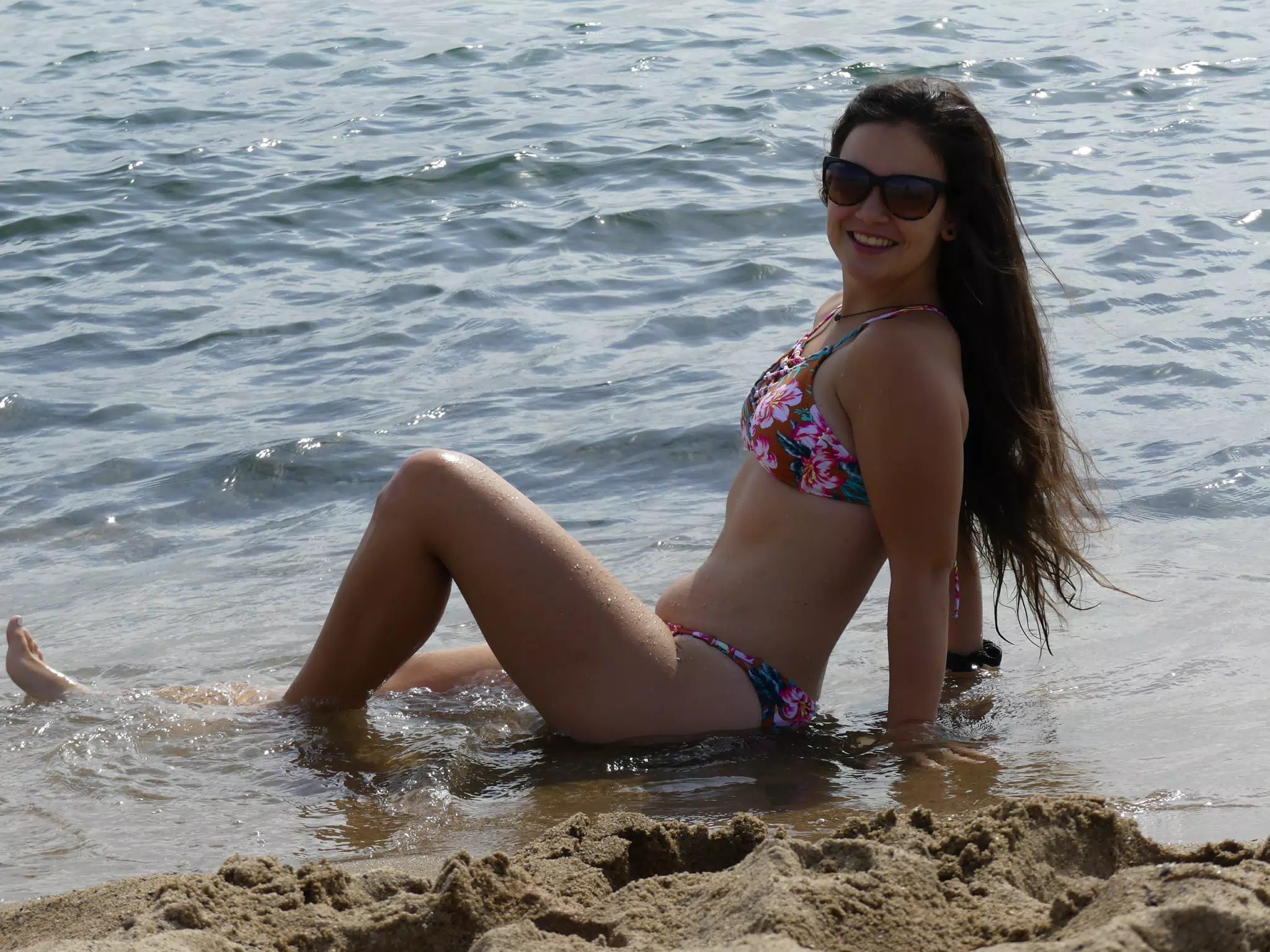 Model Sinking Into the Sand in Barcelona