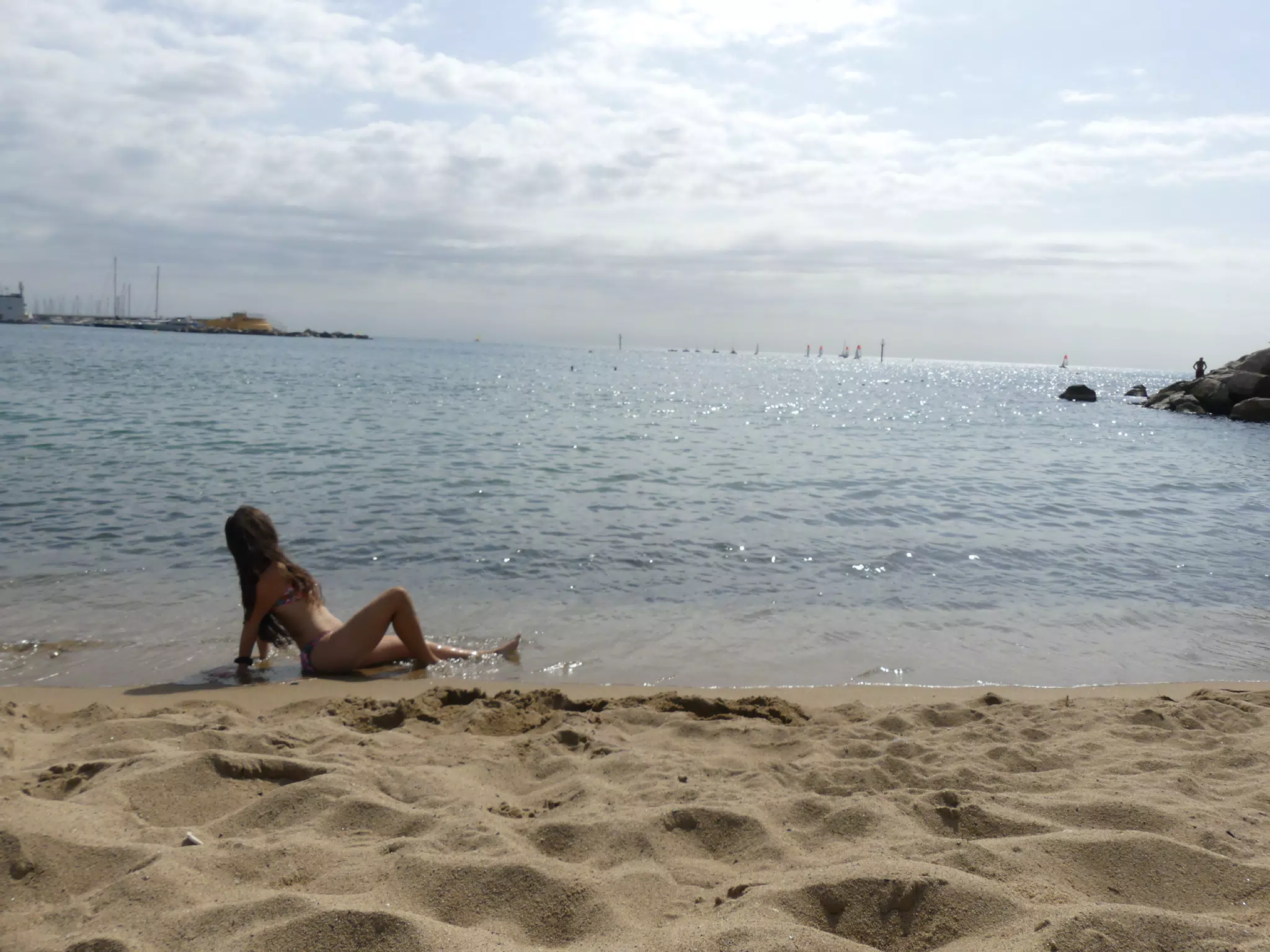 Teen Bikini Model on the Mediterranean Posing on the Beach