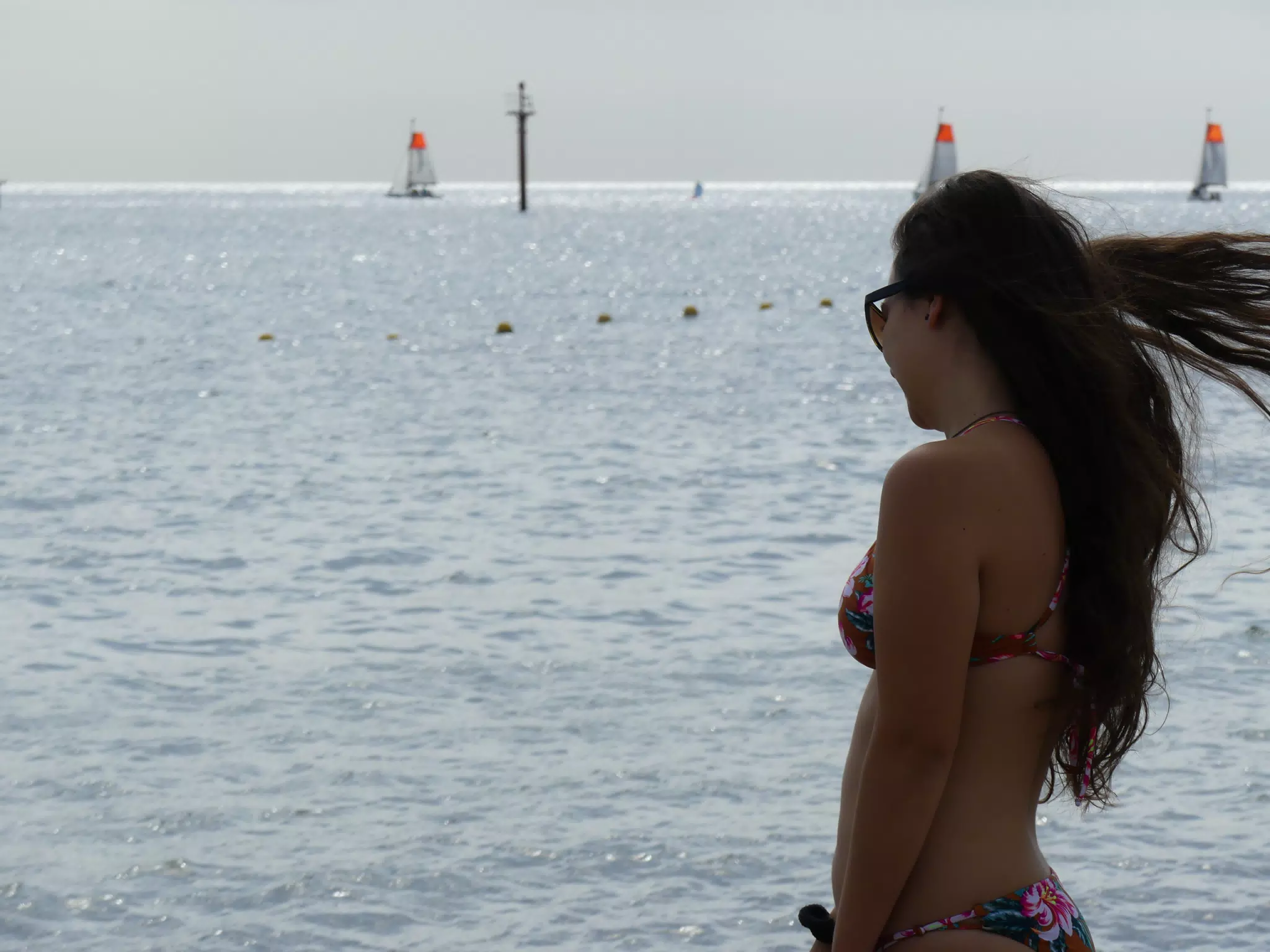 Wind Blowing Girl's Hair on Beach