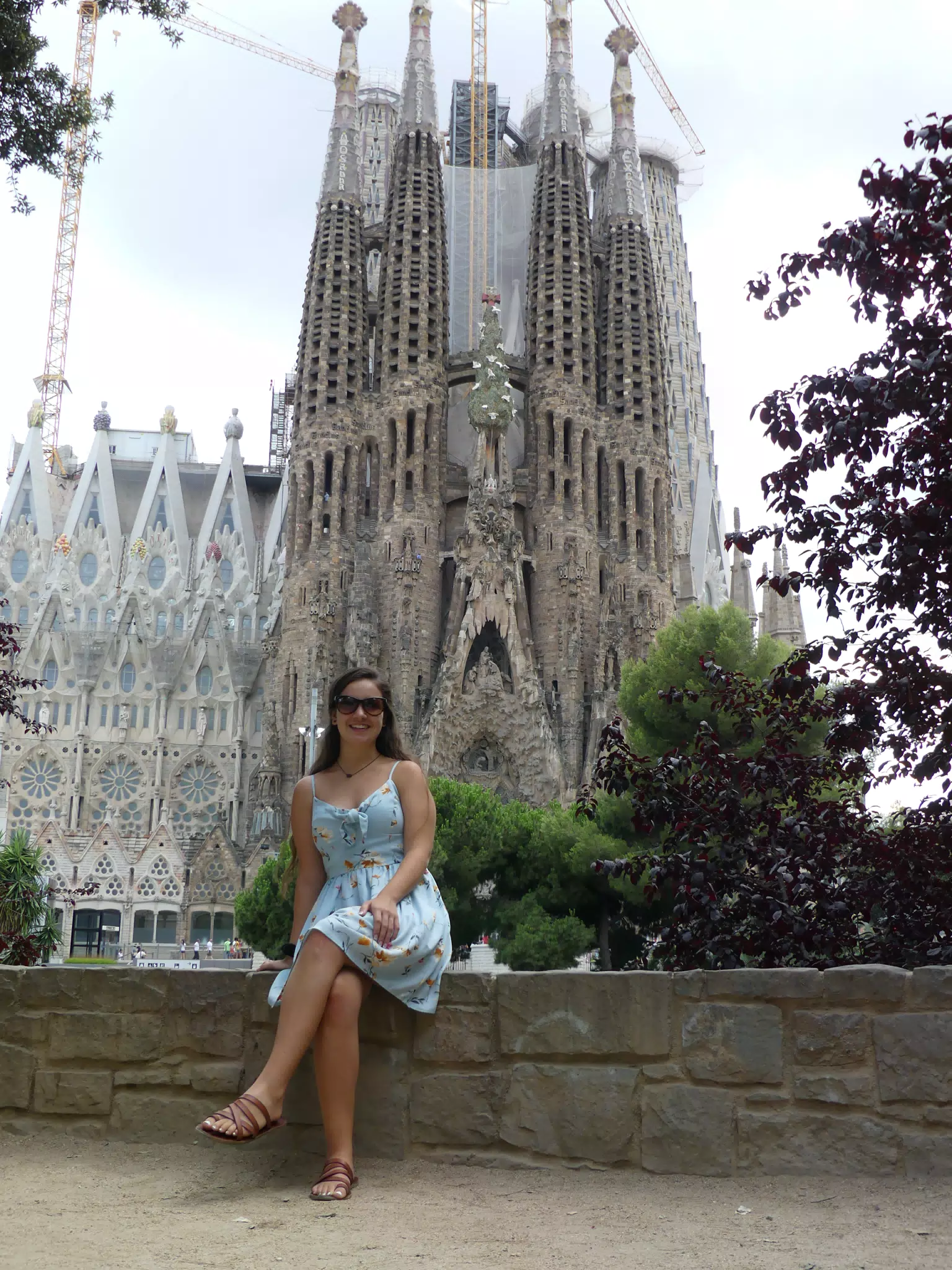 Teen Model Emily in Barcelona at the Sagrada Familia Cathedral in Dress and Sandals