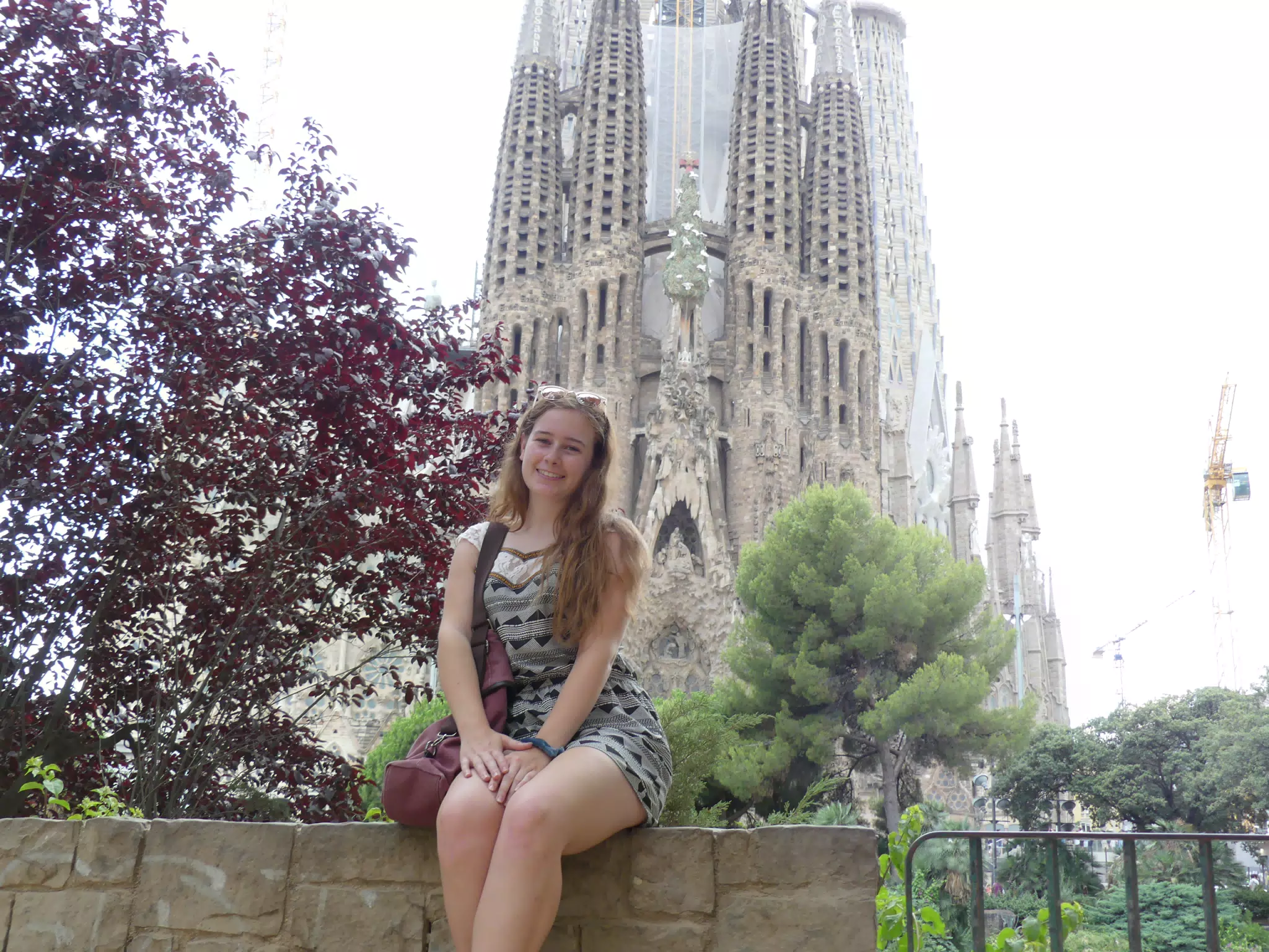 Madeline Posing in Front of the Sagrada Familia in Barcelona
