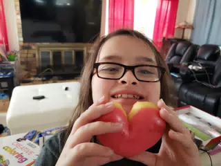 Luciana with Heart Donut