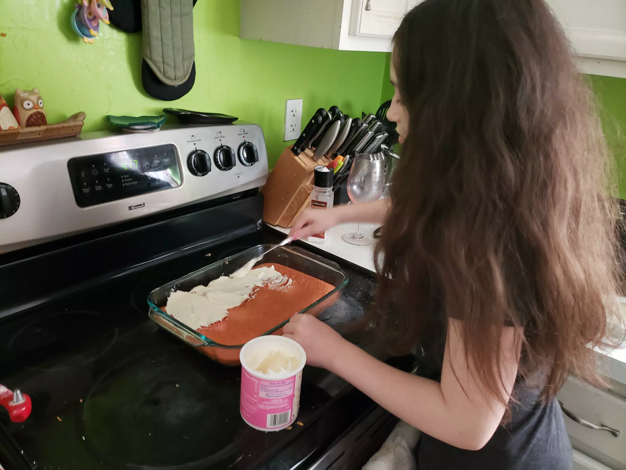 Liesl Frosting Her Cake