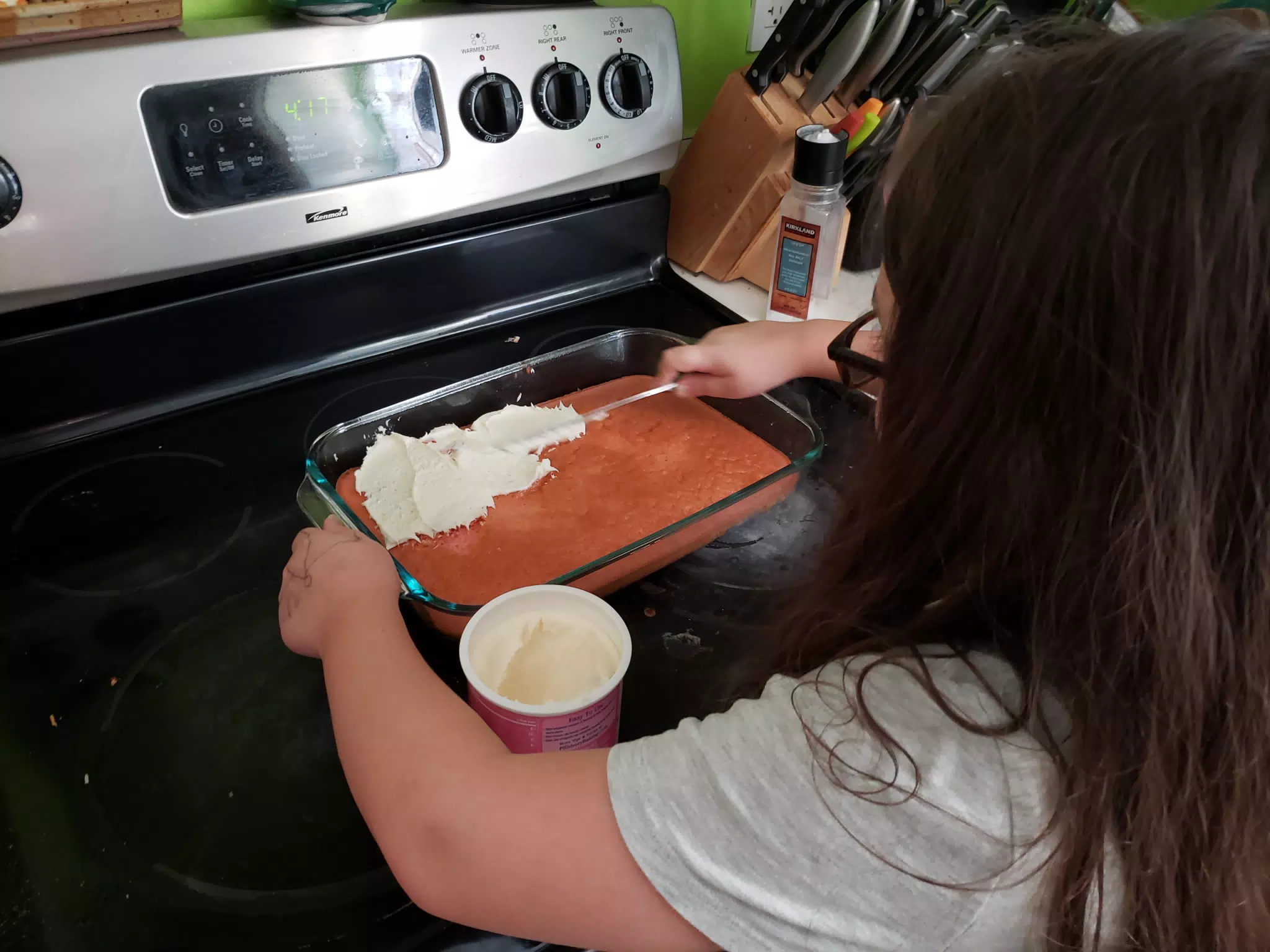 Luciana Frosting Her Cake
