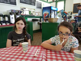 Liesl and Luciana Waiting for Mac and Cheese at the Genesee Country Village Museum