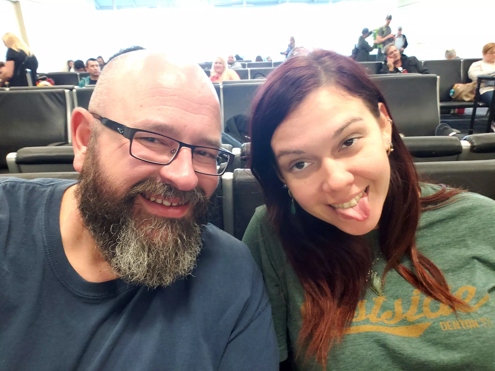 Scott and Rachel waiting at DFW for Our Flight