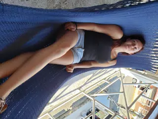 Rachel in Hammock at El Barrio Cafe Hotel Rooftop