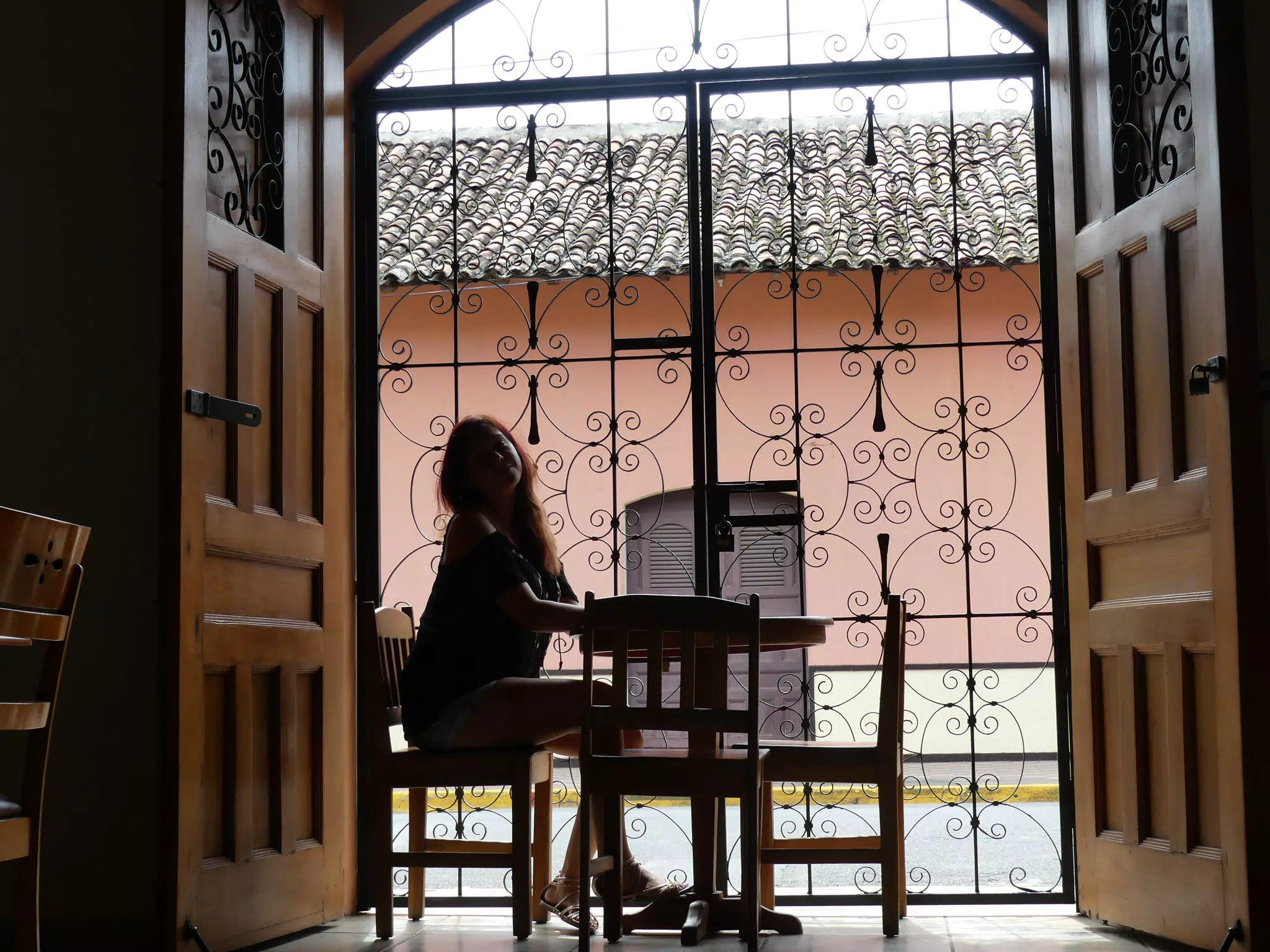 Rachel in Window of El Almirante in Granada