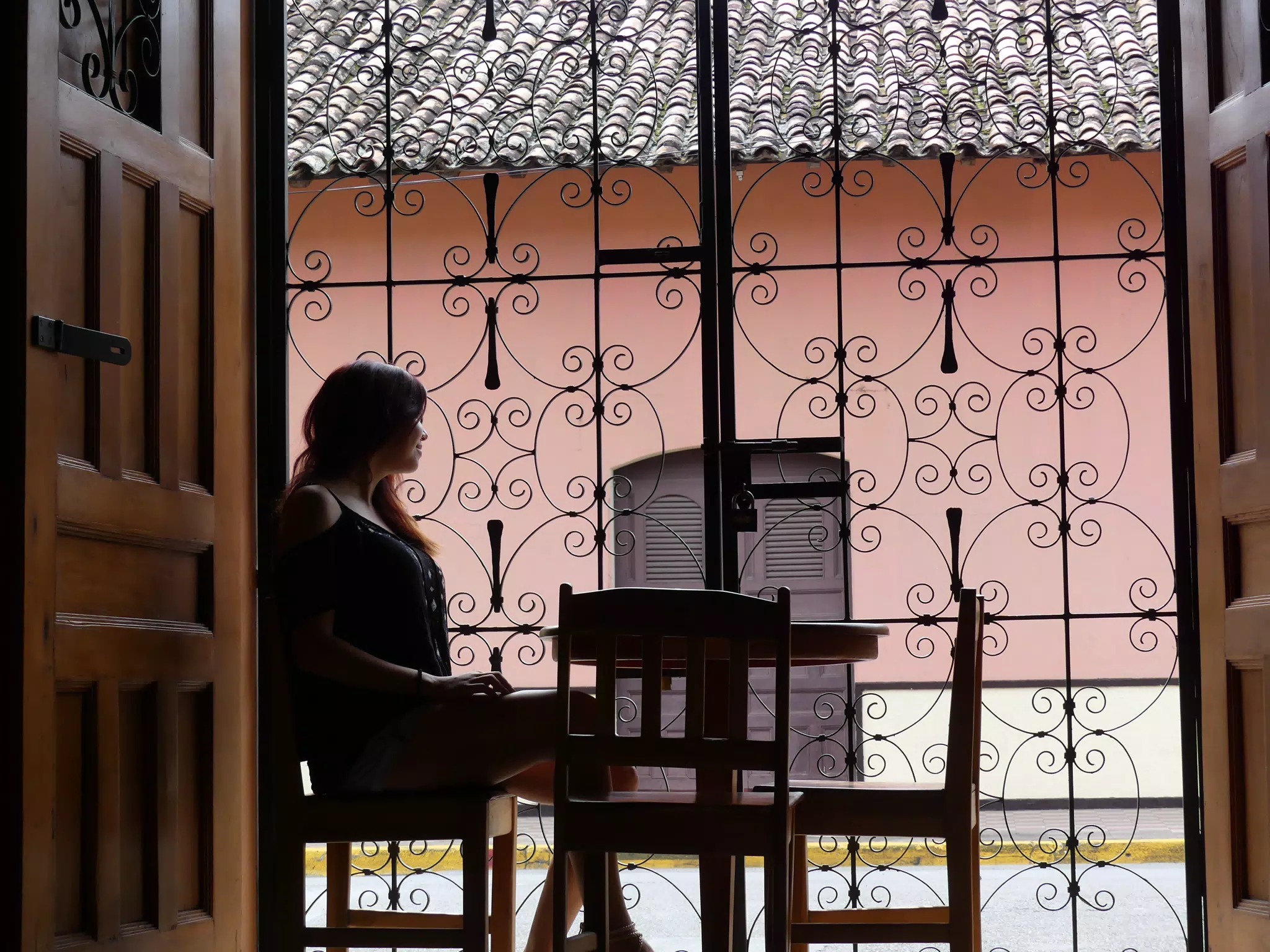 Rachel in Window of El Almirante in Granada