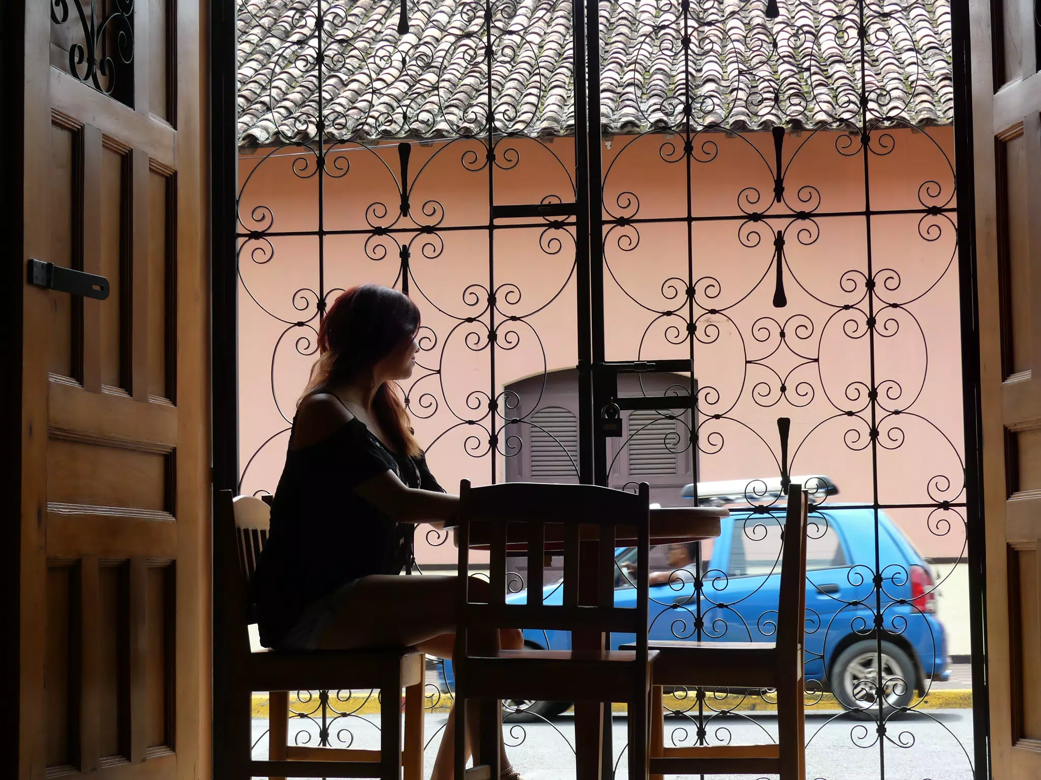 Rachel in Window of El Almirante in Granada