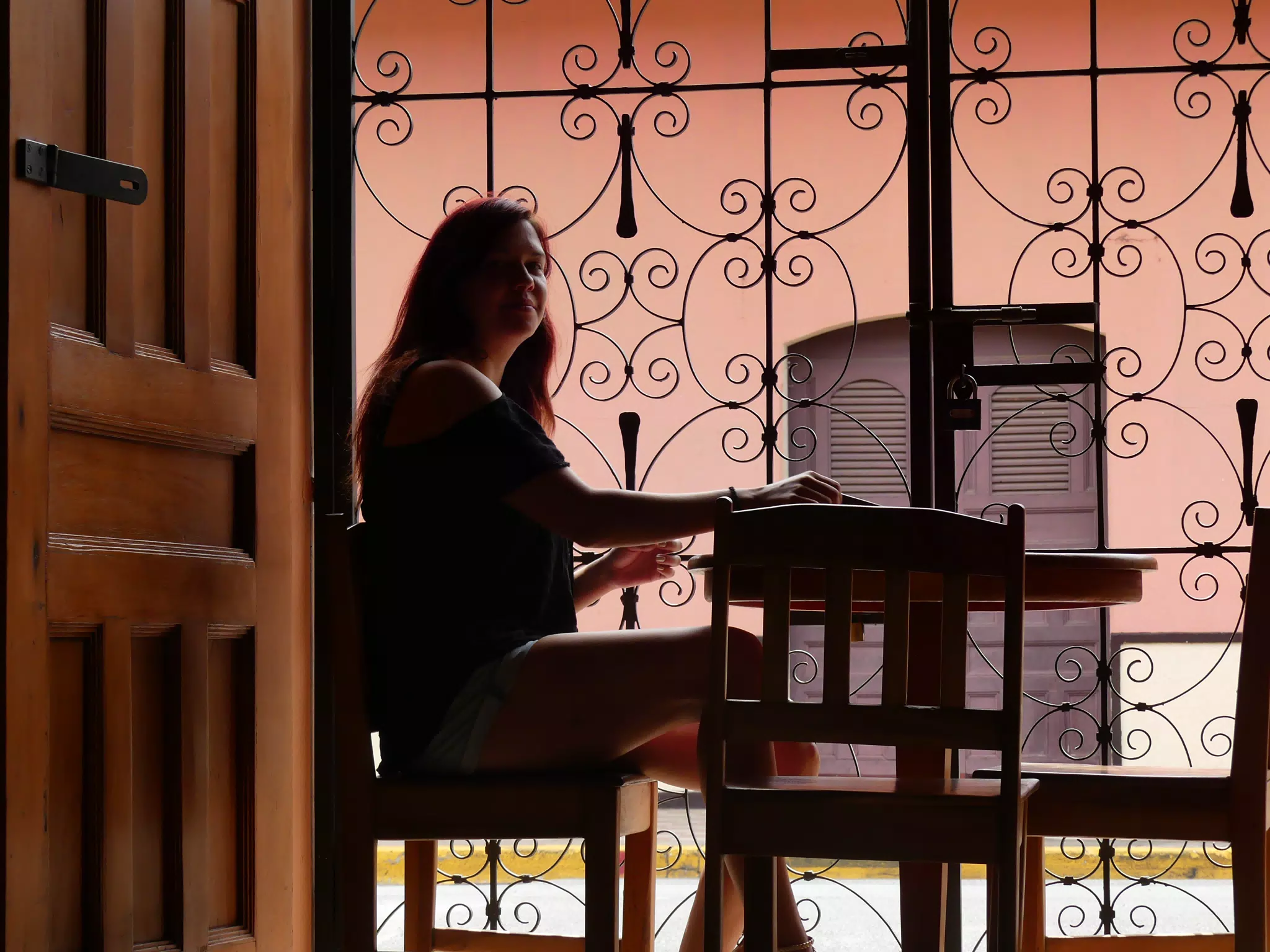 Rachel in Window of El Almirante in Granada