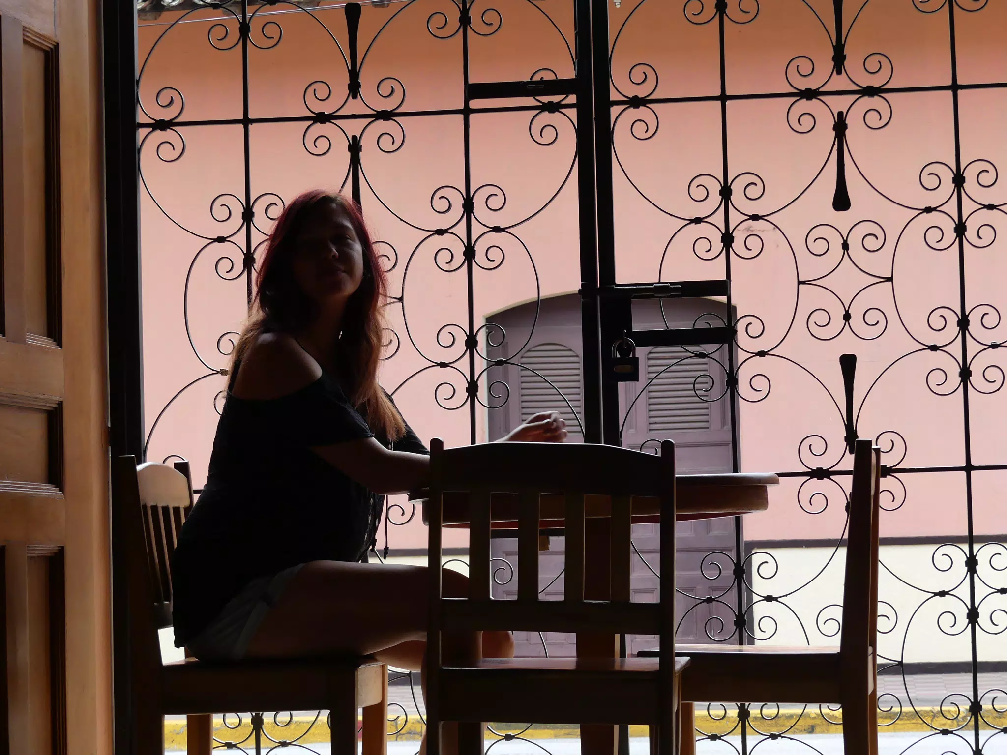 Rachel in Window of El Almirante in Granada
