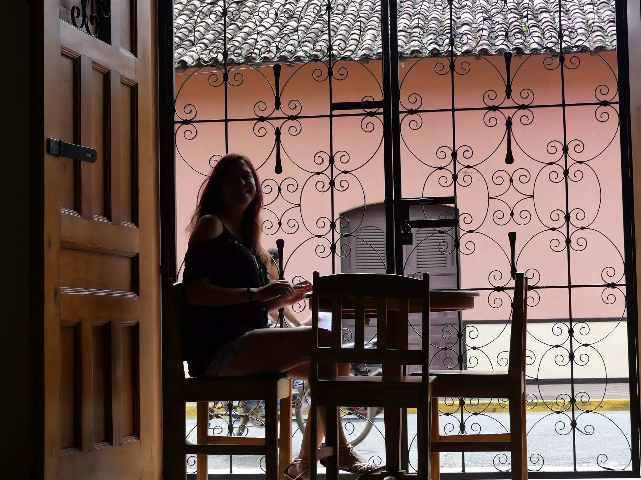 Rachel in Window of El Almirante in Granada
