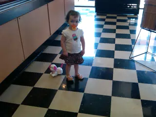 Liesl at the Bagel Shop with Her Puppy