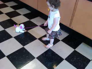 Liesl Pulling Her Puppy