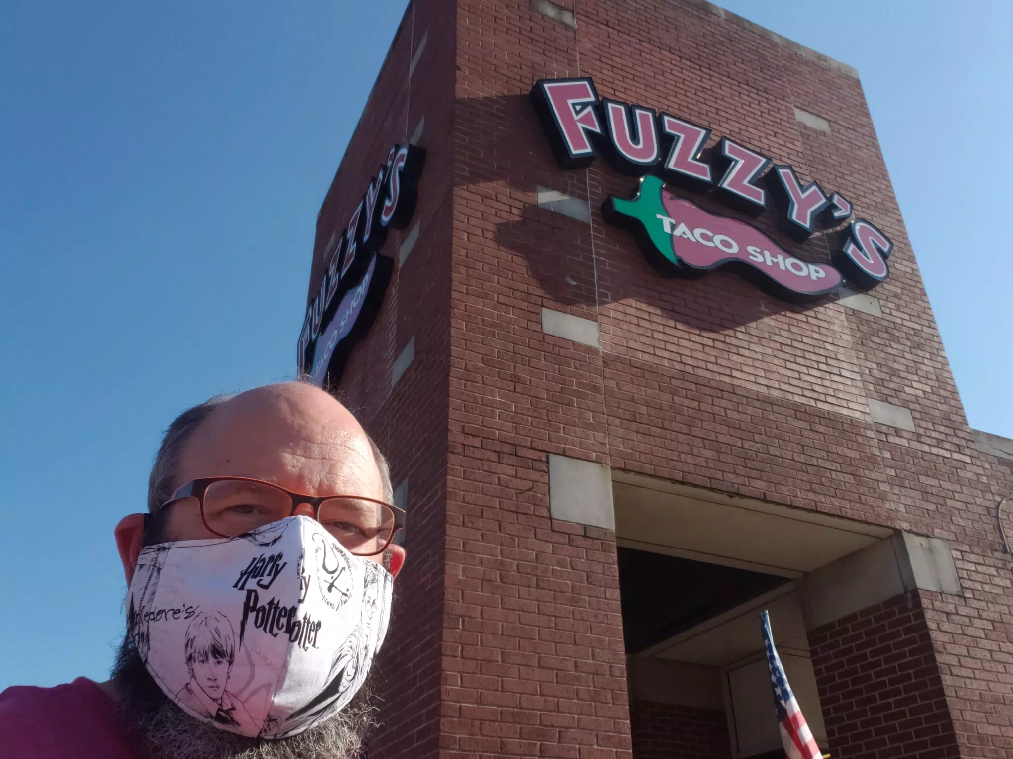 Fuzzy Taco's on Midway in COVID Mask