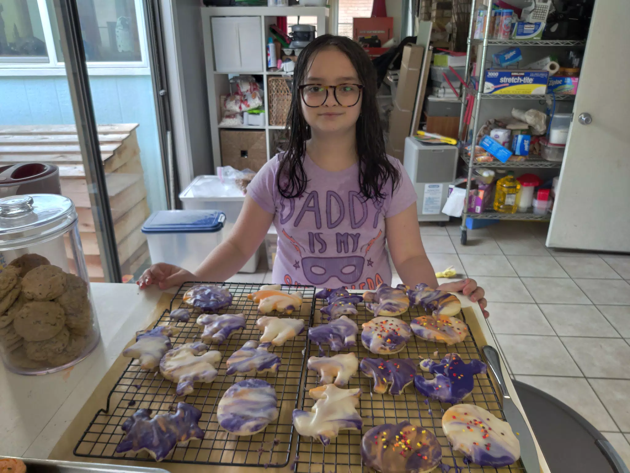 Luciana Showing Off Their Decorated Cookies