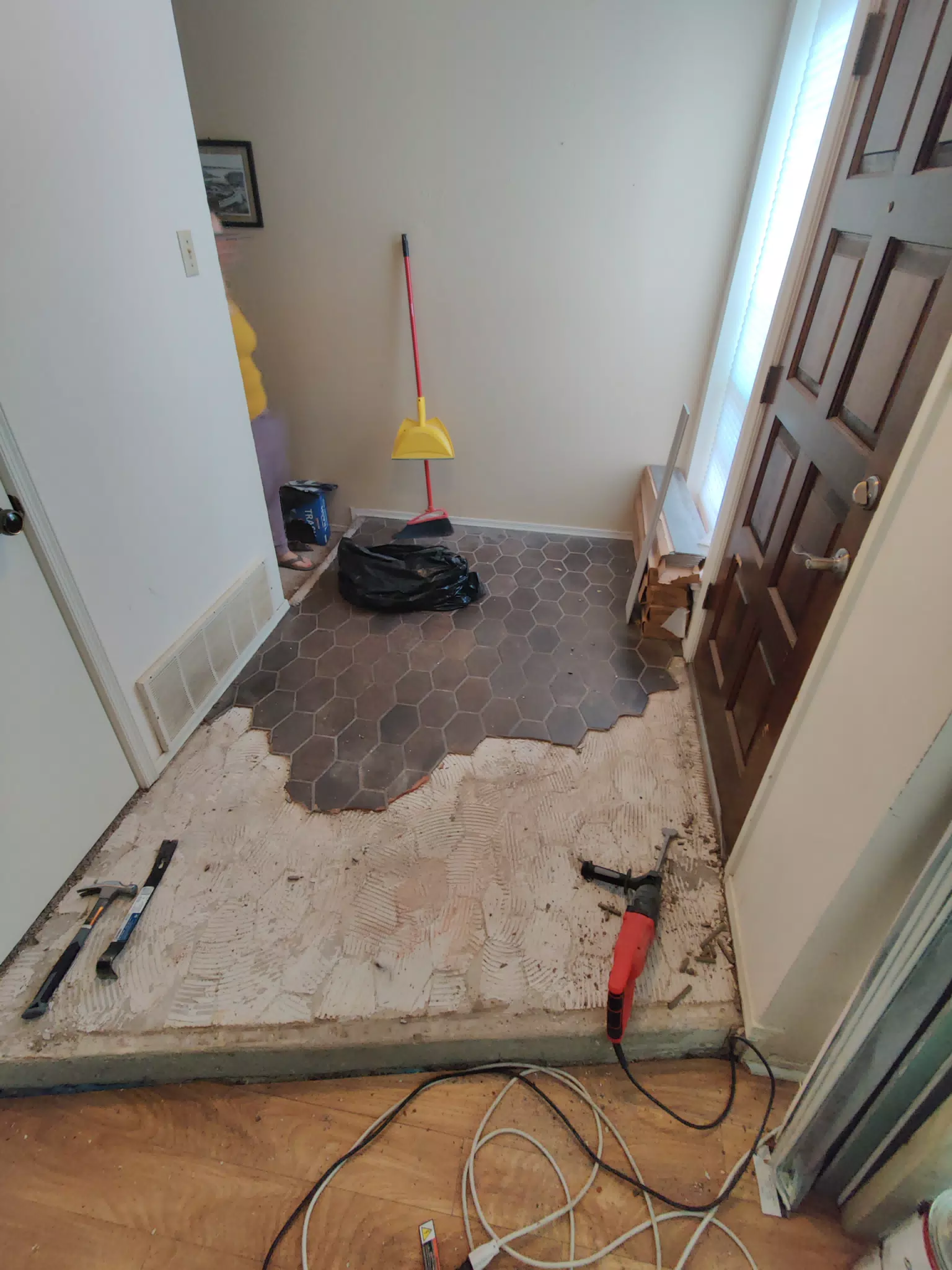 Tiling the Front Entrance