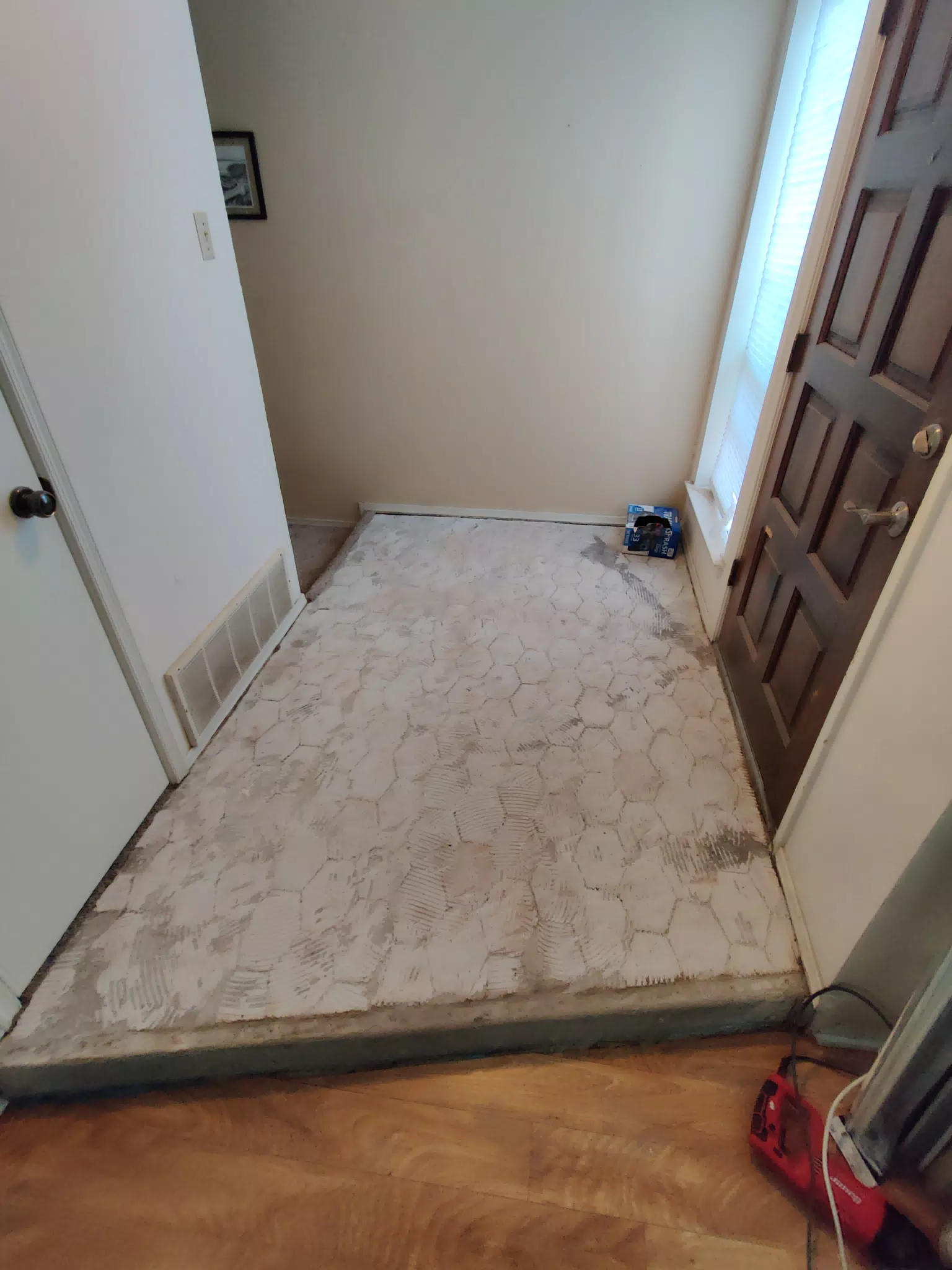 Tiling the Front Entrance