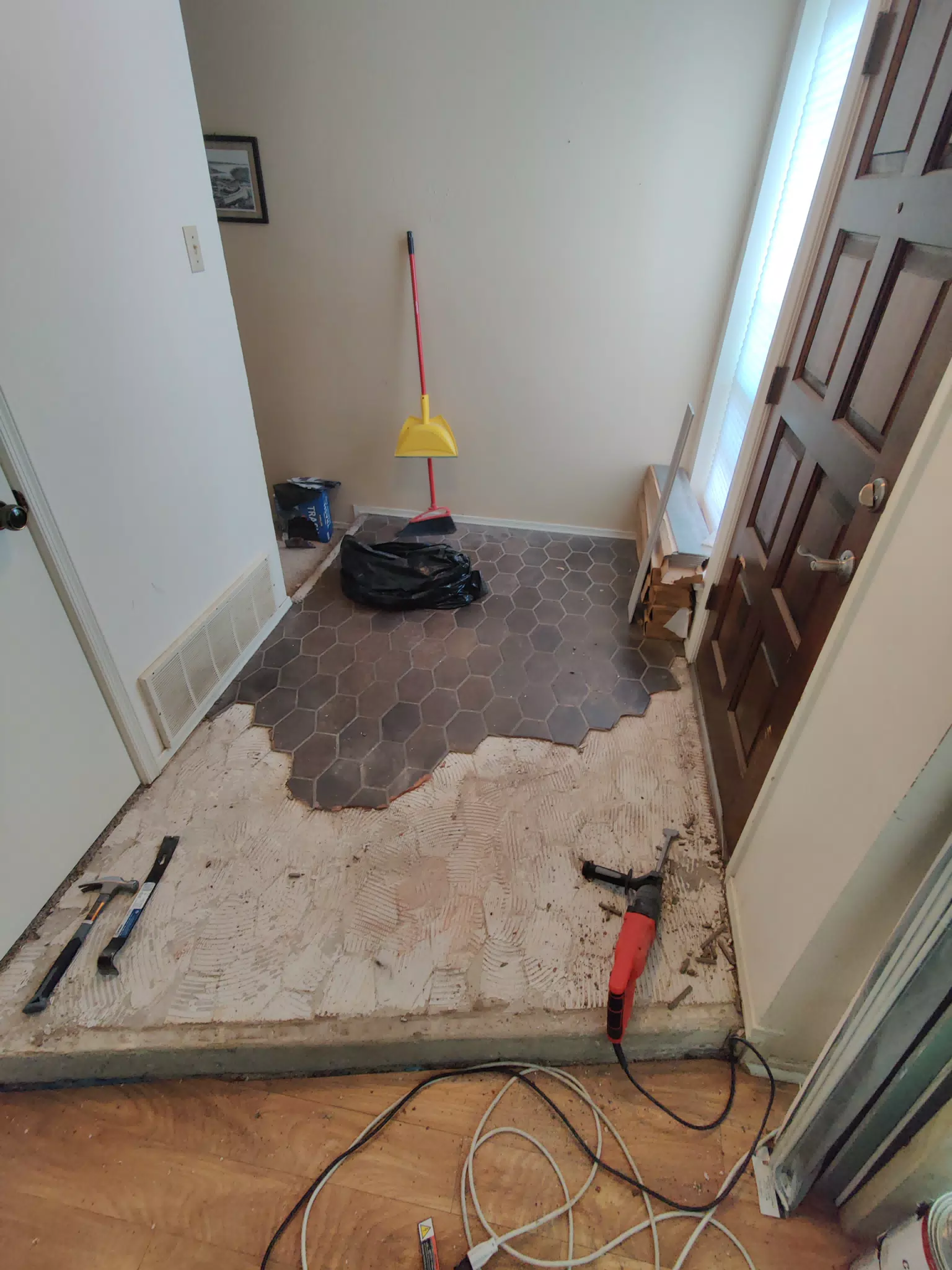 Tiling the Front Entrance