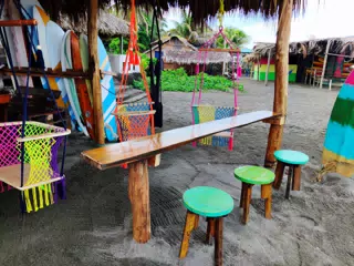 Swings and Stools at Beach Bar