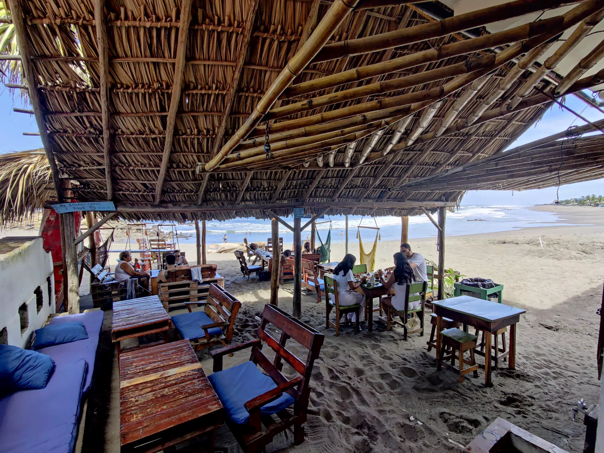 Light Crowd Eating Lunch Out on the Beach