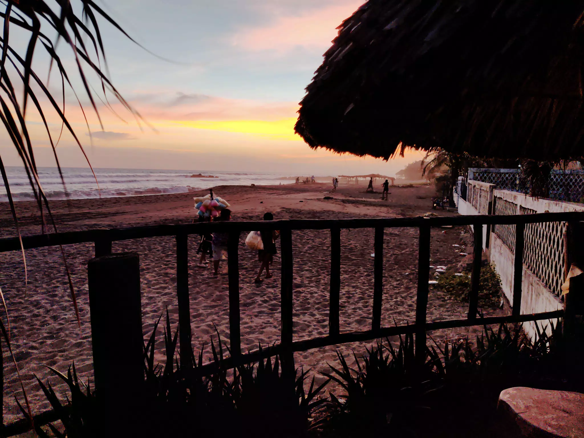 Cotton Candy Sellers on Beach at Sunset from Mano a Mano Hostel