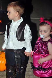 Garrett and Liesl Holding Hands