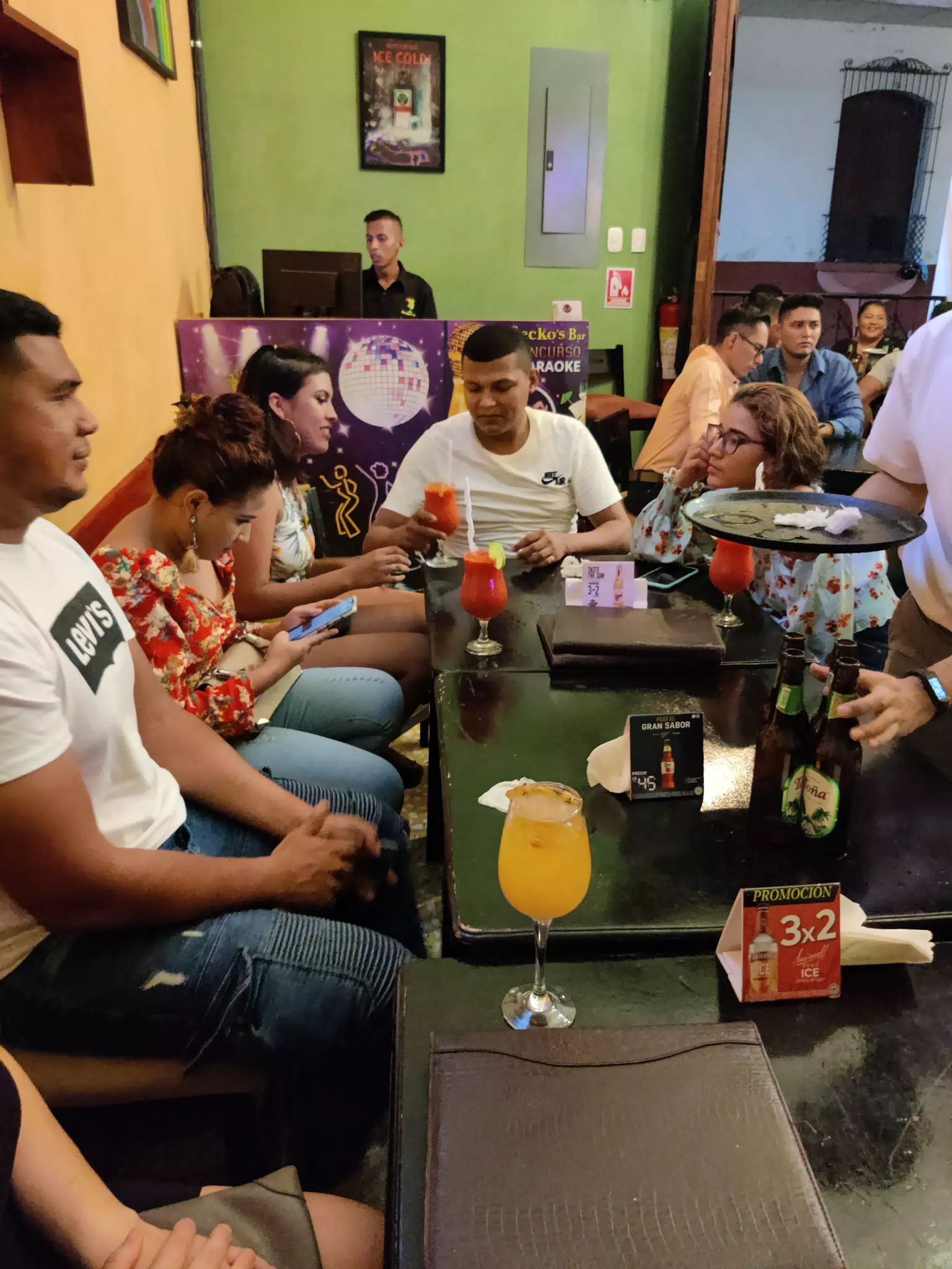 Everyone on their Phones at the Bar