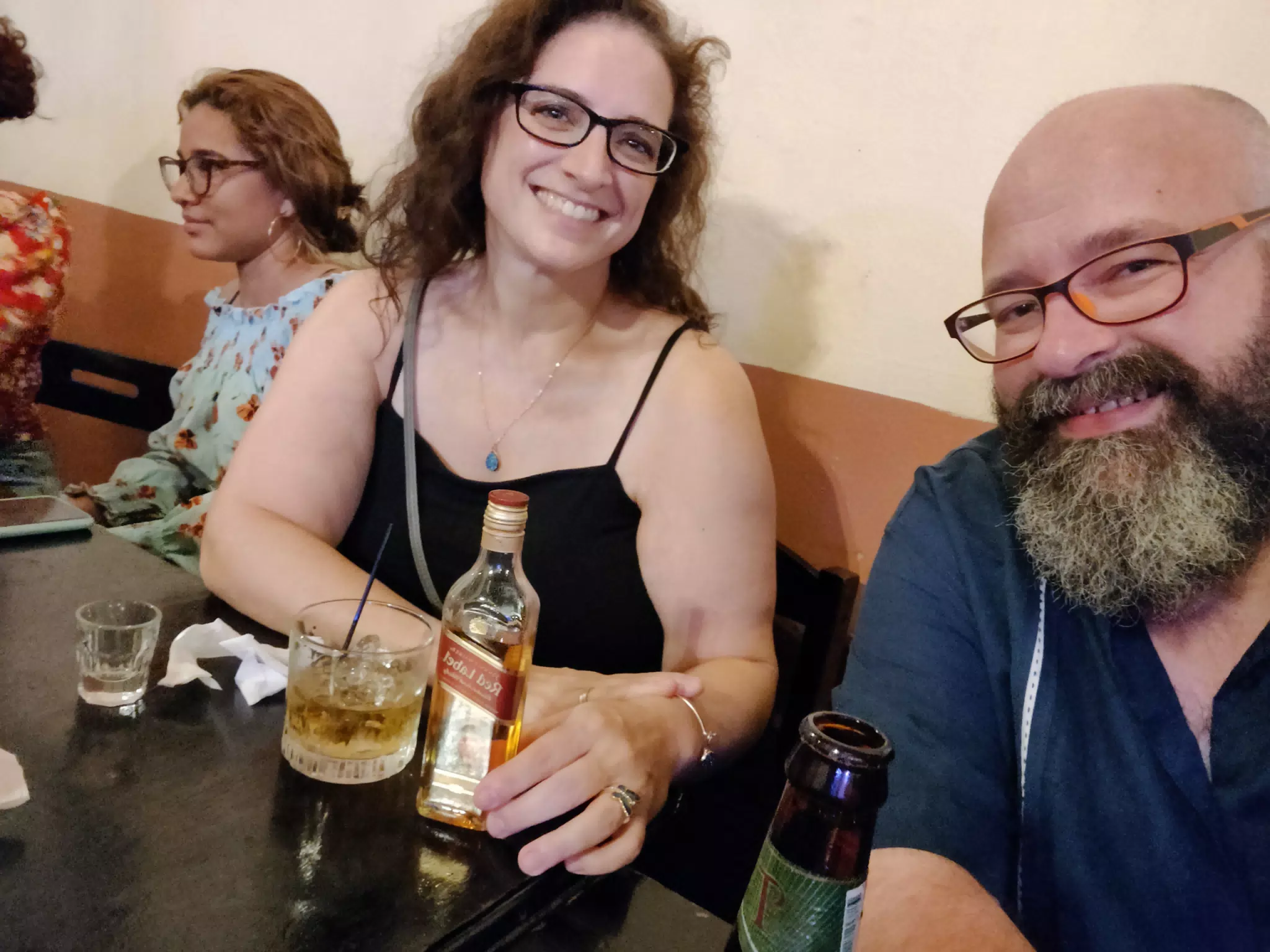 Dominica with her Whiskey Bottle