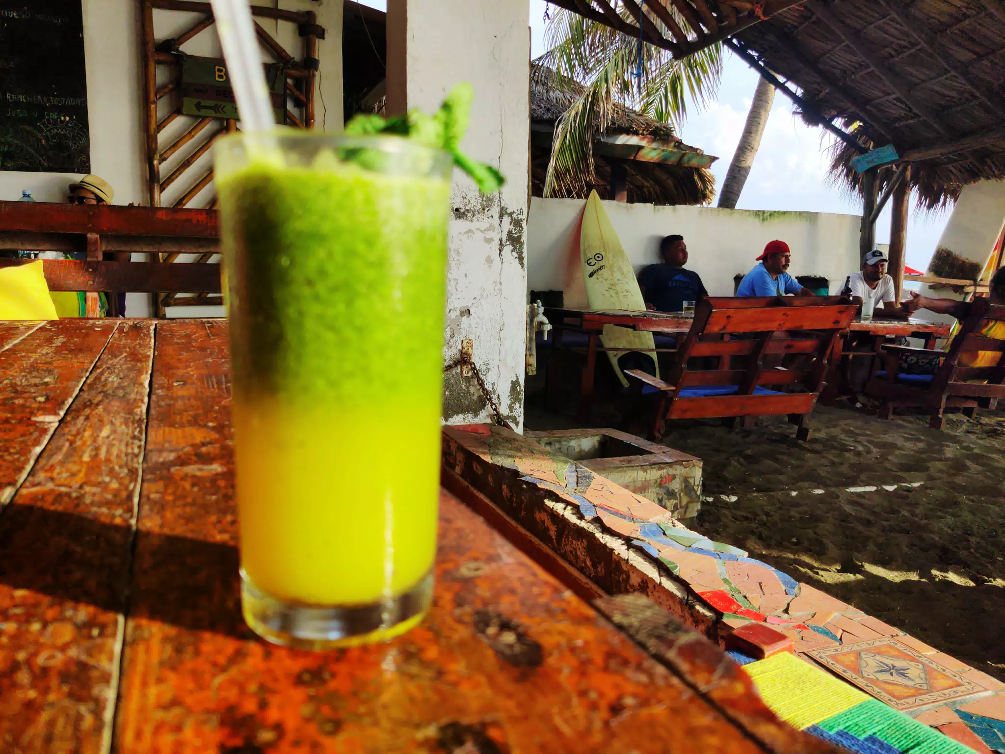 Guests at Beach Bar with Calala Mojito