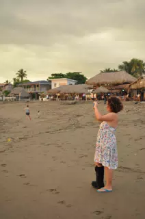 Ivonne with Foot in Cast Taking Pictures of the Sunset