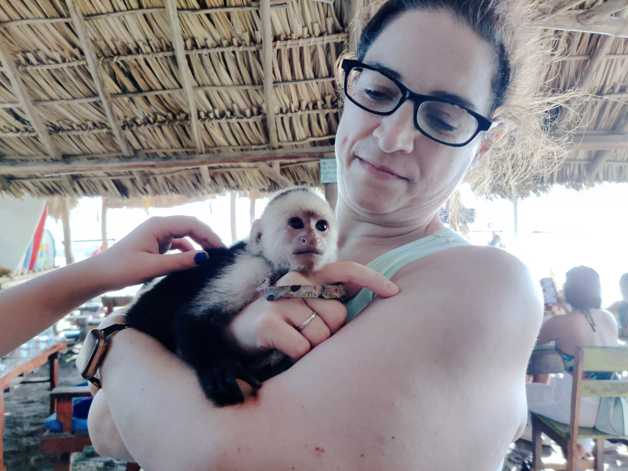 Dominica Holding Baby Monkey