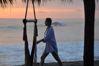 Girl Walking Past on Beach