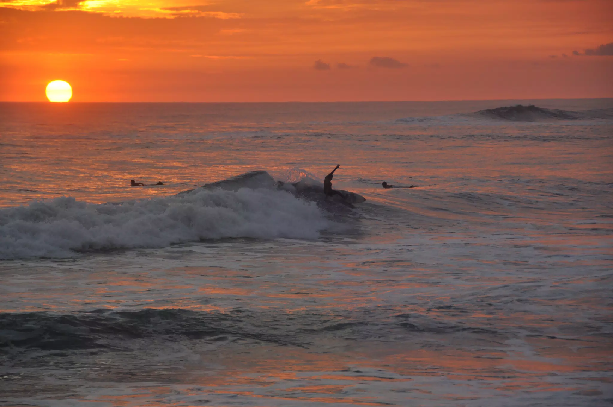 Surfers in Las Penitas Sunset on the Pacific Ocean