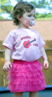 Liesl Watching Her Cousin Garrett Drive His Big Wheel