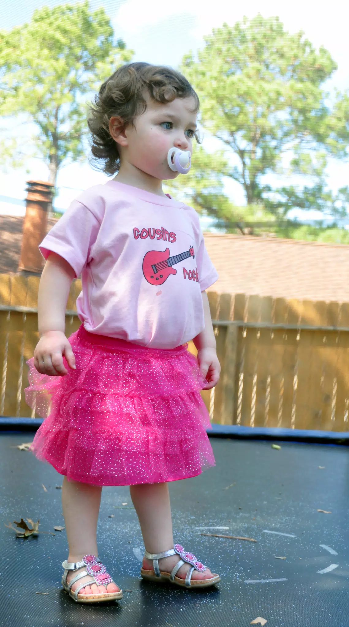 Liesl on Trampoline with Glitter and Pacifier