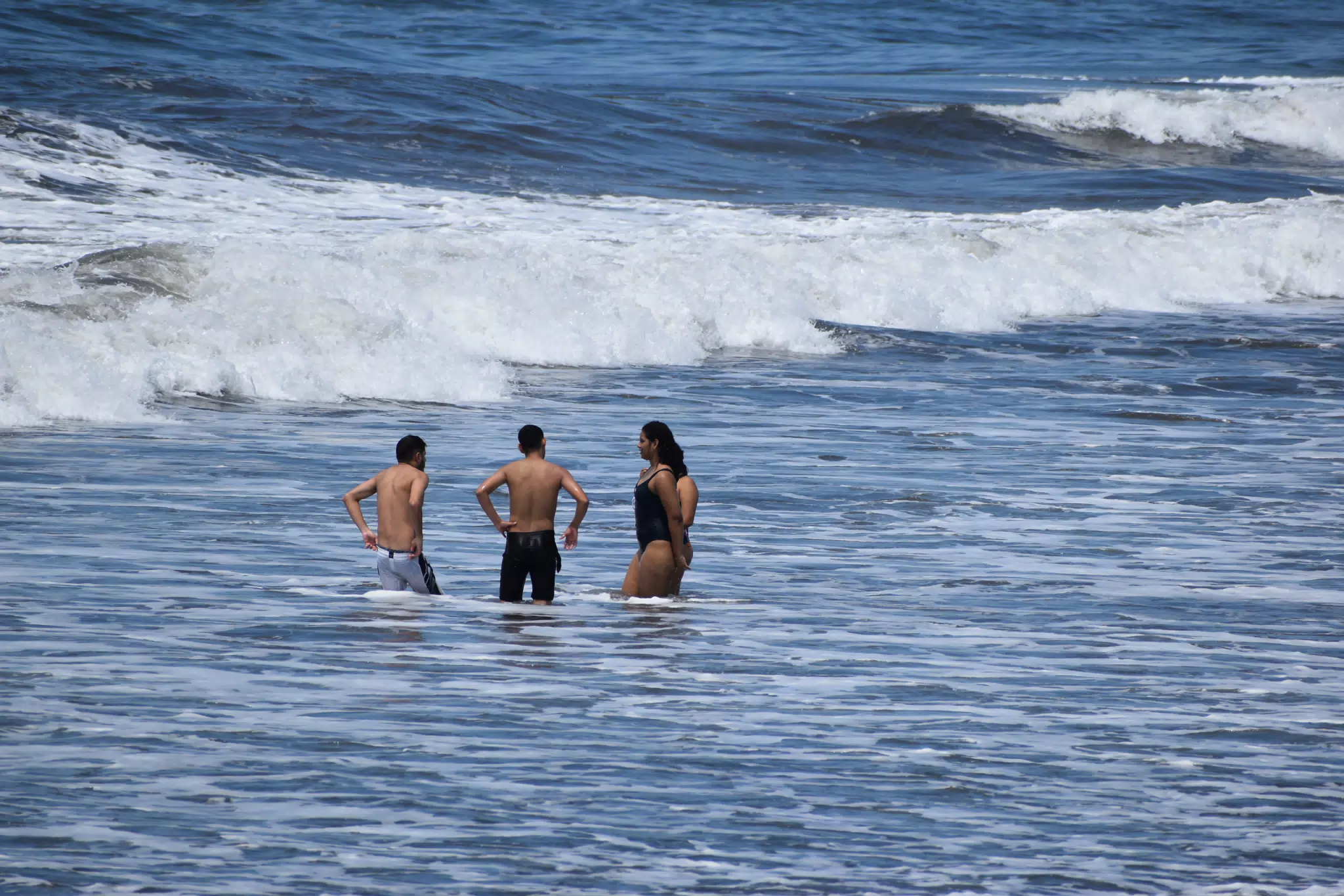 Swimmers in Pacific Ocean