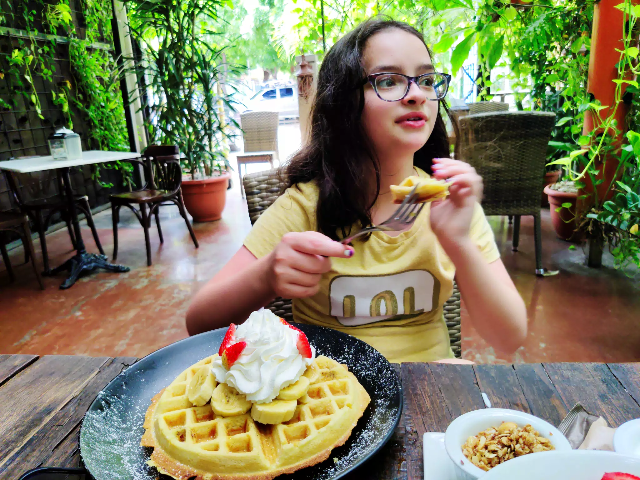 Luciana Eating Waffles at Molino in Managua