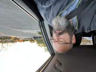 Scott Looking Out the Car Windows in Geneseo