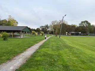 Ciana Running in Highland Park in Geneseo