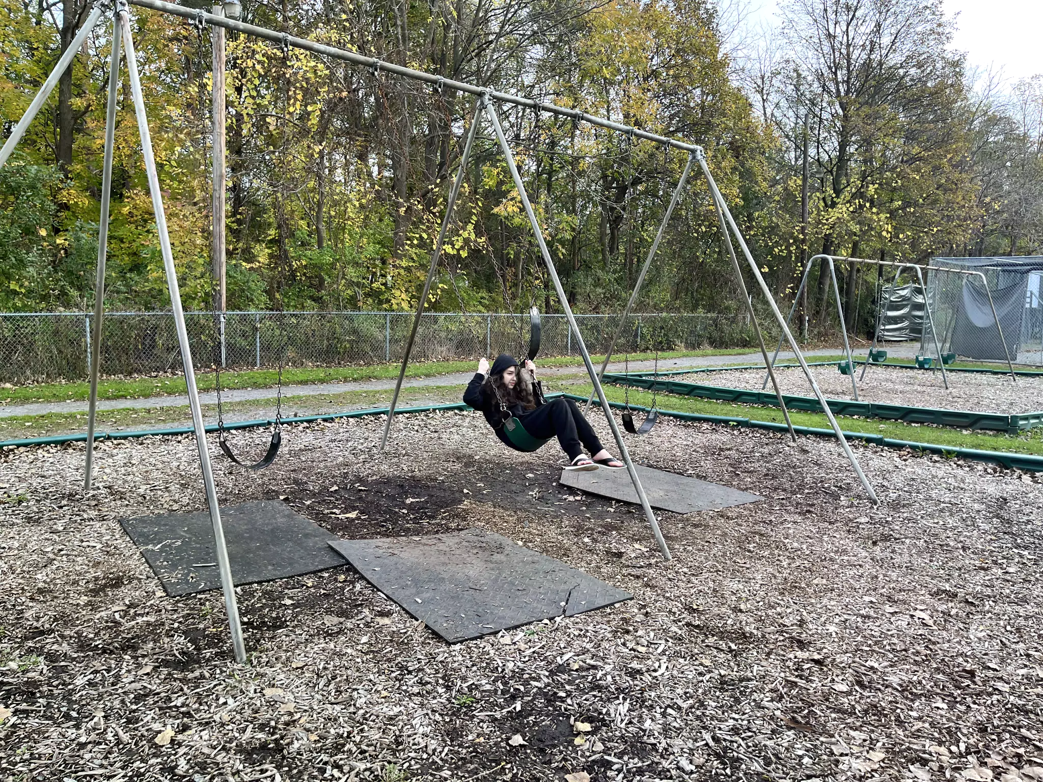 Liesl on the Swings at Highland Park in Geneseo