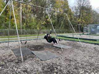 Liesl on the Swings at Highland Park in Geneseo