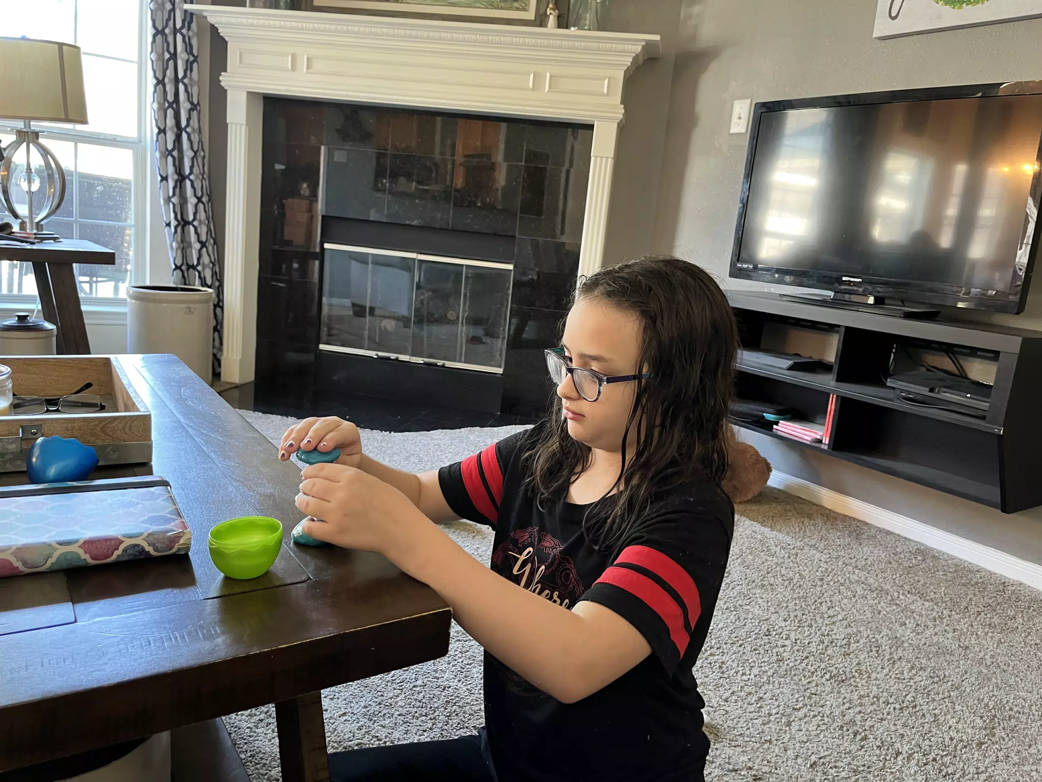 Luciana Making a Sculpture