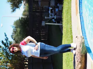 Dominica Posing by Back Yard Swimming Pool in Texas